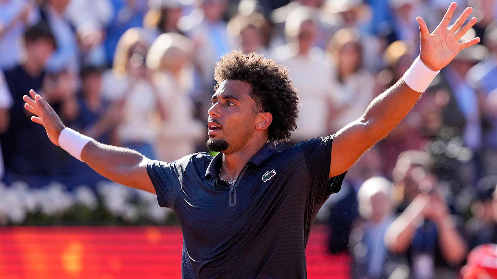 Arthur Fils celebrates winning the title in Barcelona on Sunday.